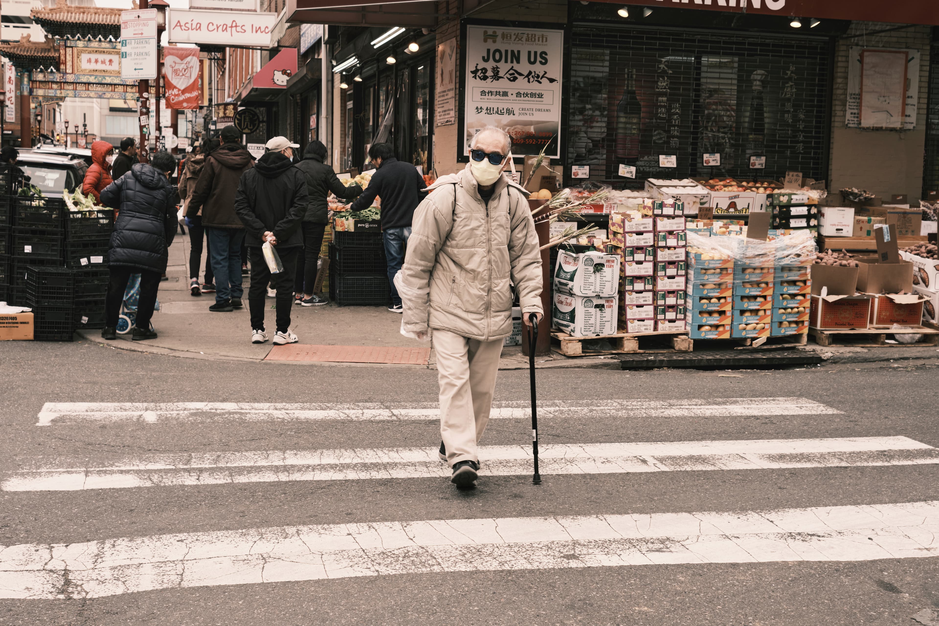 Documentary frame shot at f8, subject embedded in the surrounding environment